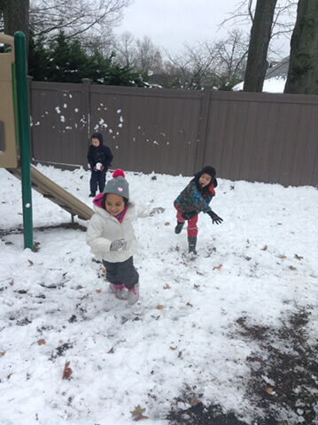 Kids playing with snow
